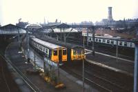 The normal 303 service stands alongside new 314s at Helensburgh in 1979 just prior to their introduction on the Argyle line.<br><br>[John McIntyre //1979]