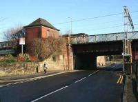 Having crossed the bridge over the Monkland Canal basin a Motherwell - Cumbernauld service runs into Coatbridge Central past a tall building reaching from road to platform level. Anybody know what it is/was? <br><br>[John Furnevel 16/01/2007]