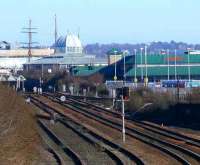 Dundee Central Junction, the Tay Bridge line comes in centre right. Buildings are on former LNER goods yard. The tall ship mast is <i>SS Discovery</i> and the dome is <i>Discovery Centre</i>. Main attraction in Dundee City.<br><br>[Brian Forbes 17/02/2007]