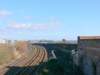 The Tay Bridge line gradually descends from Esplanade station to meet the Perth line on the south approach to Dundee. See the road bridge centre right.<br><br>[Brian Forbes 17/02/2007]