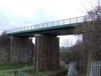 This viaduct was renewed a few years ago after I had reported being able to see through the sleepers to the ground below... bridge was painted in <i>Railtrack Green</i>.<br><br>[Colin Harkins 25/02/2007]