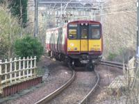 314211 just left Langside downhill for Glasgow Central on the Outer.<br><br>[Colin Harkins 26/02/2007]