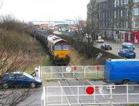 Coal empties held at Seafield level crossing on 1 March 2007 on their way back from Cockenzie power station to Leith Docks.<br><br>[John Furnevel 01/03/2007]