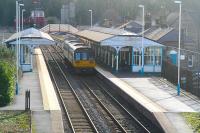 Looking east over Hexham station in February 2007, with an eastbound DMU preparing to depart. The station once boasted significant goods facilities, bay platforms at both ends and a locomotive shed. There were branches south to Allendale and north to Reedsmouth, thence the Wansbeck Valley to Morpeth or Border Counties to Riccarton Junction.<br><br>[John Furnevel 26/02/2007]