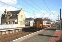 An Edinburgh Waverley - Glasgow Central via Shotts service arrives at Kirknewton on 5 March 2007.<br><br>[John Furnevel 05/03/2007]