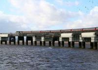 A southbound HST heads out onto the Tay Bridge on 6 March past ongoing work on the 3 year maintenance and refurbishment programme announced in September 2006.<br><br>[John Furnevel 06/03/2007]