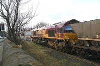 Empties from Cockenzie power station returning to the coal import terminal at Leith Docks held at Seafield level crossing on 1 March awaiting access to Leith South yard. <br><br>[John Furnevel 01/03/2007]