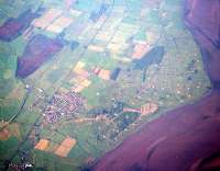 Depot at Eastriggs seen from the air. The G&SW mainline runs from top middle to bottom left and the sidings can be seen coming off from the bottom left.<br><br>[Ewan Crawford //]