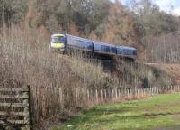 Southbound train passing the site of an early closure, Rohallion station, south of Dunkeld.<br><br>[Brian Forbes 11/02/2003]