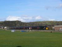 GNER 125 curves northbound alongside the recreation area at Burntisland.<br><br>[Brian Forbes 15/05/2007]