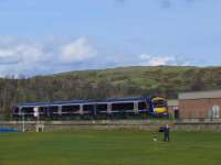 Pettycur Heights are background to a 170 as it slows for the Burntisland stop.<br><br>[Brian Forbes 15/05/2007]
