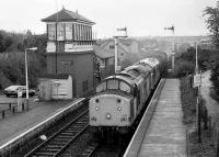 37797 heads a pair of the class through Dyce in 1996 with a heavy freight for Elgin.<br><br>[Bill Roberton //1996]