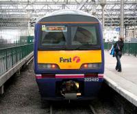 A North Berwick 322 ready to leave Waverley platform 4 as the last passenger rushes to board on 17 March.<br><br>[John Furnevel 17/03/2007]