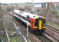 SWT liveried 158789 on a Waverley - Newcraighall service seen shortly after leaving Brunstane in March 2007 on the final leg of its short journey.<br><br>[John Furnevel 31/03/2007]