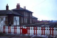 Leeming Bar in 1982 looking west towards Wensleydale. Part of the unique portico standing at the entrance to the station building can be seen on the left. <br><br>[John McIntyre //1982]