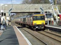 318266 racing through Lochwinnoch with an express service bound for Ayr.<br><br>[Graham Morgan 20/03/2007]