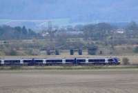 1612 Glasgow - Inverness train near Hilton Jn with the bow string viaduct over the River Earn on the ENR seen behind.<br><br>[Brian Forbes 22/03/2007]