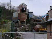 Cults Limestone Railway. The loading depot with the hoppers being filled from the chute above the pallet. There were a few limestone pits within easy reach of this closed facility. Narrow Gauge but no trace of a rail now.<br><br>[Brian Forbes /01/2007]