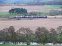 The 1612 Glasgow Queen Street - Inverness races through Strathearn towards Perth, with the River Earn for company.<br><br>[Brian Forbes 23/02/2007]