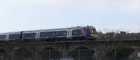 Edinburgh-Aberdeen 170 comes off the Tay Bridge and crosses the arches on the approach to Dundee.<br><br>[Brian Forbes 25/03/2007]