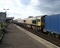 66516 takes containers north on the through road at Leamington Spa on 21 March 2007 as a Voyager makes a stop on its way south.<br><br>[John McIntyre 21/03/2007]