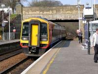 SWT 158786 draws to a stand at Bridge Of Allan. No destination is shown, but it is travelling south.<br><br>[Brian Forbes 26/03/2007]