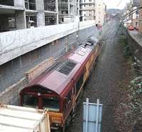 EWS 66230 about to leave Powderhall depot with the <I>Binliner</I> on 1 March 2007.<br><br>[John Furnevel 01/03/2007]