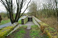 Southern tunnel exit from Kilbarchan station. Just beyond two double track bridges cross the farm access road.<br><br>[Ewan Crawford 29/03/2007]