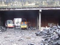 Digger and Dumper truck use to clear the debris... tyres a plenty.<br><br>[Colin Harkins 29/03/2007]