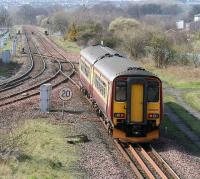 A Bathgate bound train slows for the crossover at Niddrie West on 31 March while taking the diversionary route round the 'sub' from Waverley.<br><br>[John Furnevel 31/03/2007]