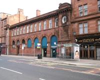 <I>What's in a name...?</I>  Bridgeton Cross (1892), Bridgeton Central (1954), Bridgeton (1965), Ladbrokes (1980), To Let (2007), ...what next for the classic facade on London Road? The Station Bar looks on unconcerned.... unlike Mr Bean.<br><br>[John Furnevel 01/04/2007]