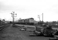 A class 26 pilots a 47 south past Ferryhill Junction, on 23 April 1973.<br><br>[John McIntyre 23/04/1973]