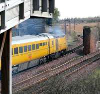 The Measurement Train turns towards Millerhill having just passed through Brunstane and the site of the former Niddrie North Junction on 31 March. The line in the foreground is the <I>sub</I> to Niddrie West.<br><br>[John Furnevel /03/2007]