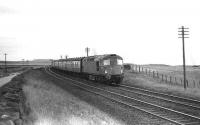 26033 on the 0925 Aberdeen - Glasgow near Cove on 07 December 1974.<br><br>[John McIntyre 07/12/1974]