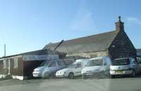 Station buildings at Oldmeldrum, still intact in 2007. Sight now used as a bus garage. Looking west.<br><br>[Graham Morgan 01/04/2007]