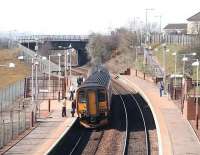 Whifflet - Glasgow Central service picks up passengers at Bargeddie on 3 September 2007. Note the <I>train protection</I> measures applied to the footbridge.<br><br>[John Furnevel 03/09/2007]