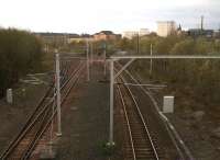 Looking west over High Street East Junction towards High Street station and Glasgow city centre on 8 April 2007. The CGU line from Clydebridge Viaduct comes in on the left to join the GCDR, while the line from High Street to Bridgeton Central passed under the formation in Gallowgate Tunnel. In the background stood the great goods depots of College (left) and High Street (right) with the massive warehouse of the former now standing as flats in the left background.<br><br>[John Furnevel 08/04/2007]