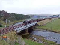 <h4><a href='/locations/C/Crawford_Viaduct'>Crawford Viaduct</a></h4><p><small><a href='/companies/C/Caledonian_Railway'>Caledonian Railway</a></small></p><p>LMS 6233 crossing Crawford viaduct on 9 April 2007 with <I>The Great Britain</I> bound for Glasgow 4/10</p><p>09/04/2007<br><small><a href='/contributors/John_Robin'>John Robin</a></small></p>