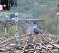 A4 whistle sounds in the distance. 60009 passing Tesco (site of former Perth Caley shed) over a mile away with <I>The Great Britain</I>.<br><br>[Brian Forbes 10/04/2007]