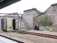 Famous hole in the wall on the west side of Perth station with a carriage washer on the old running loop.<br><br>[Brian Forbes 10/04/2007]