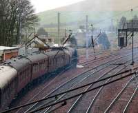 6233 is routed into the Abington down loop on 9 April with <I>The Great Britain</I> railtour to take water. The locomotive is passing the road tanker which arrived 20 minutes earlier from Penrith where it had undertaken the same task.<br><br>[John Furnevel 09/04/2007]