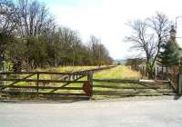 The former Heriot station looking south in April 2007. One of the old level crossing gates has finally given up. [See image 4118] <br><br>[John Furnevel 06/04/2007]