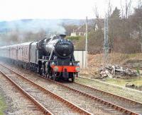 Stanier 8F 48151 coasts through Ardgay with <I>The Great Britain</I> railtour on 12 April.<br><br>[John Gray 12/04/2007]