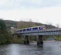 Eastbound 170 halfway across the <I>wee Tay bridge</I>. The river splits in two for Moncrieff Island seen under the piers.<br><br>[Brian Forbes 09/04/2007]