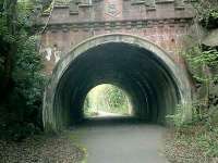 Caledonian Railway Lanarkshire and Dumbartonshire line, bridge built 1895. Detailed stone facing and cast-in-situ concrete lining.<br><br>[Alistair MacKenzie 13/04/2007]