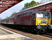 <h4><a href='/locations/G/Gleneagles'>Gleneagles</a></h4><p><small><a href='/companies/S/Scottish_Central_Railway'>Scottish Central Railway</a></small></p><p><i>The Great Britain</i> special heading home to London runs south through Gleneagles on 14 April behind 57601. 7/10</p><p>14/04/2007<br><small><a href='/contributors/Brian_Forbes'>Brian Forbes</a></small></p>