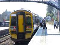 158705 at Nairn with passengers boarding for Inverness.<br><br>[Graham Morgan 31/03/2007]