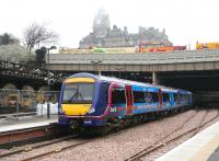 First ScotRail Commonwealth Games liveried 170 set at Waverley platform 17 on 13 April 2007. The tourist buses on Waverley Bridge seem quite impressed!<br><br>[John Furnevel 13/04/2007]