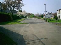 Closed NBR line where Greenhead Road Dumbarton crosses, looking West.<br><br>[Alistair MacKenzie 14/04/2007]