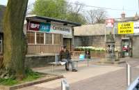 <I>'Well, well, would you look at that... Cambuslang station to be featured on Railscot website...' </I> Relaxing with the Sunday papers outside Cambuslang station in April 2007.<br><br>[John Furnevel 15/04/2007]